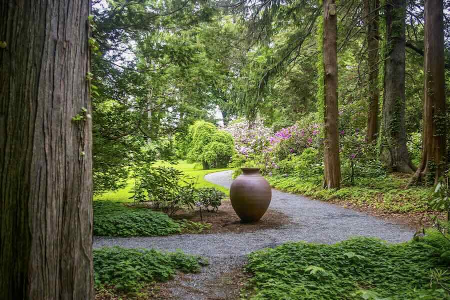 sculptural pots throughout the yard, with stephen procter